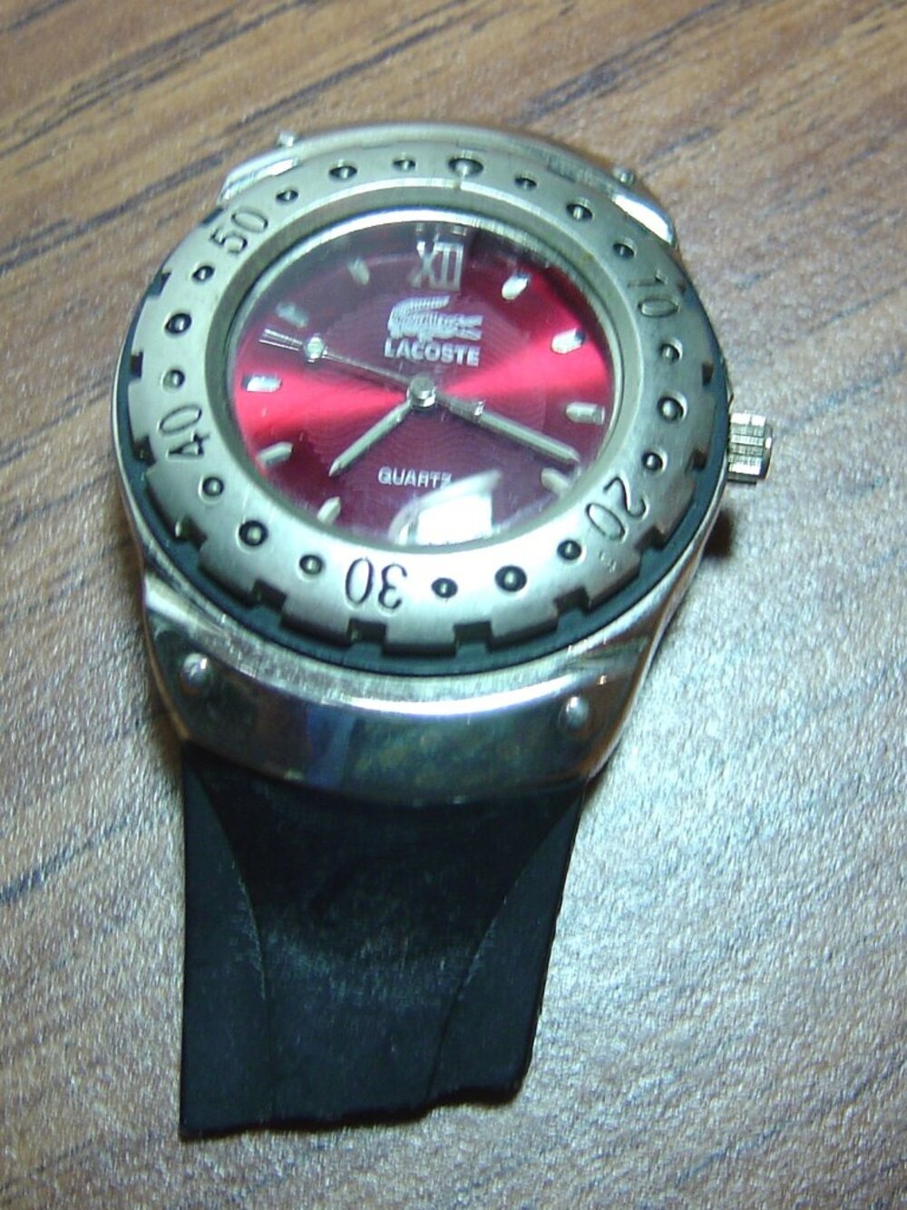 Men's Lacoste quartz watch-red dial-alligator design on dial-needs a band